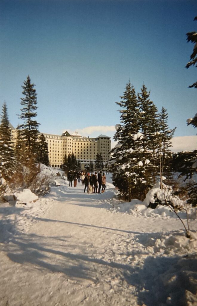 View of Fairmont Hotel, the Chateau, on the lake; walkway around the lake